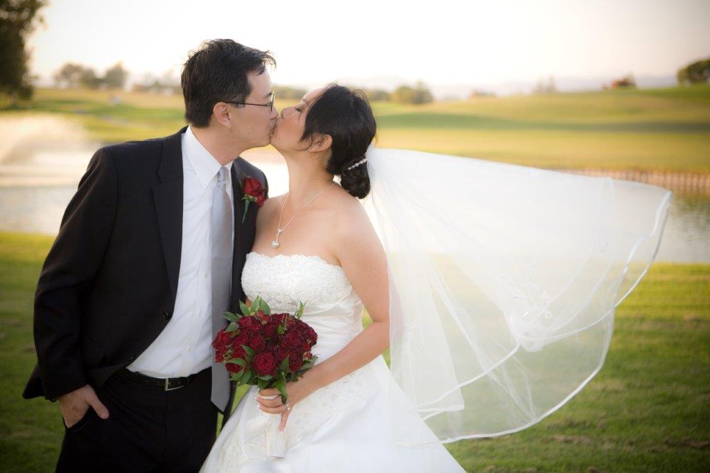 Newlyweds kissing